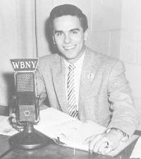 A young Daffy Dan Neaverth, seen here behind a WBNY microphone, was part of the pioneer top 40 staff at WBNY. He joined the WKBW staff in early 1958 before the official switch in format