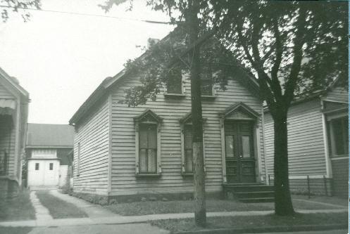 24 Coit Street: Typical of the thousands of wood framed dwellings built by German developer Joseph Bork. It was Bork who donated the land for St. Stanislaus Parish. This picture was take in the early 1940s. In addition to Bork, ownership of the property can be traced back to Charles Townsend (Townsend St.), Guilford Wilson (Wilson St.) and George Coit for whom the street is named after. The lot size is 30 feet (Front) by 108 feet (Deep). The barn in the rear of the picture was built by the Broadway Brewing & Malting Company and still stands today (2006). 