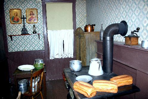 In Pittsburgh, the John Heinz History Center hosts a popular exhibit that allows visitors to walk through a home of a 1910 Polish steelworker. The exhibit features a poorly lit kitchen with simple furniture, religious icons and a large cast iron stove. Visiting the exhibit you truly feel part of the immigrant experience.